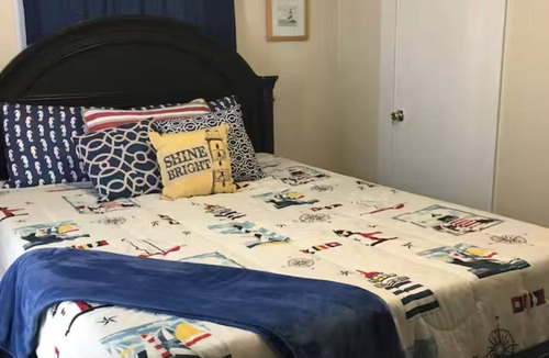 Northeast Virginia Beach Cottage | Next door to the Dome and Wave pool outdoor tiki bar with Dome in sight!