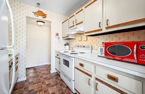 Caine Woods Condo | North OC Condo w/Outdoor Pool by Seaside Vacations & Sales