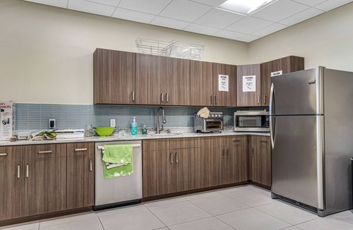 Ocean View House | Ocean View Beach Club townhome with WiFi, private patio, shared pool, & sauna