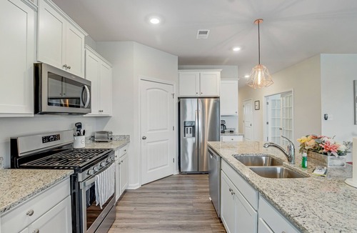 Ocean View House | Ocean View Beach Club home with bay view, private tennis court & pool access
