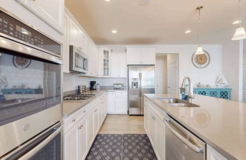 Frankford House | Ocean View Beach Club house with shared pool, sports courts, & gym