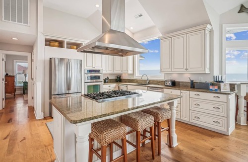 Ocean Hill House | Oceanfront 8BR Corolla retreat with pool, hot tub, and beach access.