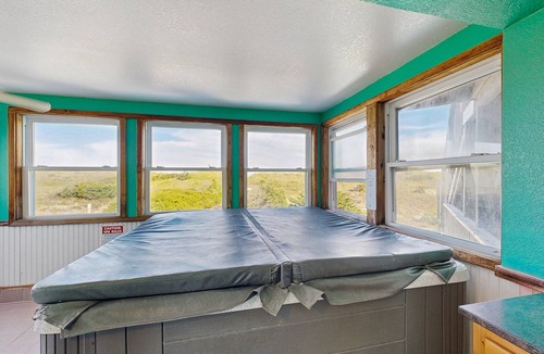 Waves House | Oceanfront home with private hot tub, outdoor pool, fireplace, & game room