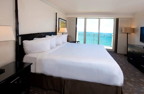 Central Beach Resort | Oceanfront Suite w/ Free WiFi, Kitchenette, & Furnished Private Balcony