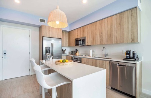 Northeast Miami Condo | One Bedroom Condo King Bed With City Views