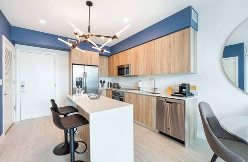 Northeast Miami Condo | One Bedroom Condo King Bed With City Views