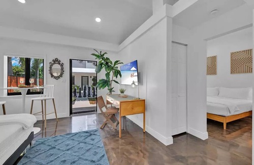 Flagler Village Apartment | One Bedroom King Suite in a Tropical Retreat Freedom House Fort Lauderdale FL