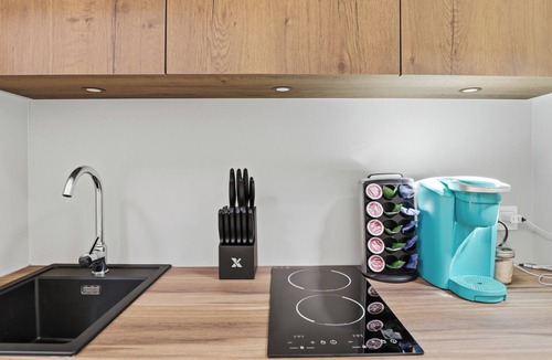 Mineral Apartment | One of kind wellness/glamping experience with wellness amenities, covered outdoor dining, a complete live fire cooking setup, and a clear star gazing top.