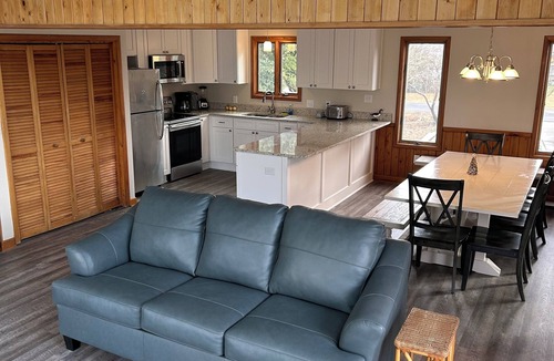 Colington Harbour House | Open Concept Home on Canal. Great for Boating Fishing Crabbing and Swimming.