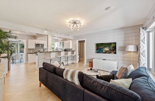 Poinsettia Heights House | Oversized Saltwater Pool! Private & Peaceful Tropical Chic Oasis!