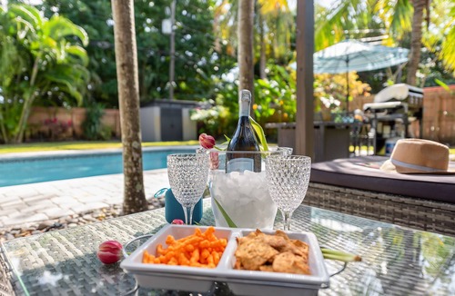 Poinsettia Heights House | Oversized Saltwater Pool! Private & Peaceful Tropical Chic Oasis!