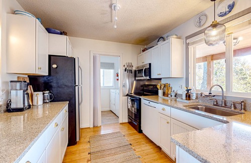 Colington Harbour House | Peaceful home on the Albemarle Sound with private beach, pool access, & grill