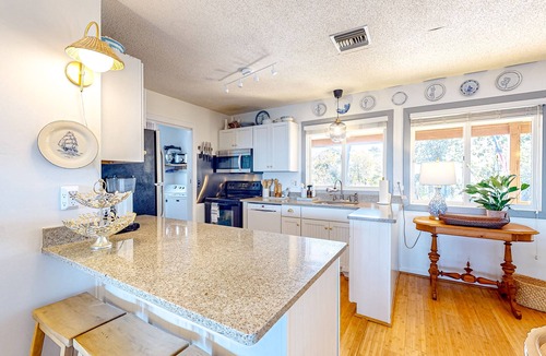 Colington Harbour House | Peaceful home on the Albemarle Sound with private beach, pool access, & grill