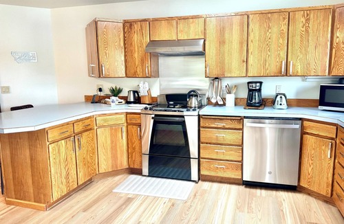 Kalispell House | Peaceful Island Retreat on Foys Lake MT – Hot Tub, Private Dock, Beach & Kayaks!