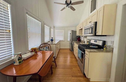 Pocasset House | Peaceful marshview escape with large sunroom, AC, outdoor firepit & dog friendly