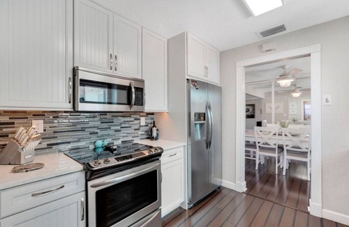Lighthouse Point House | Pet friendly house with a heated pool and hot tub!