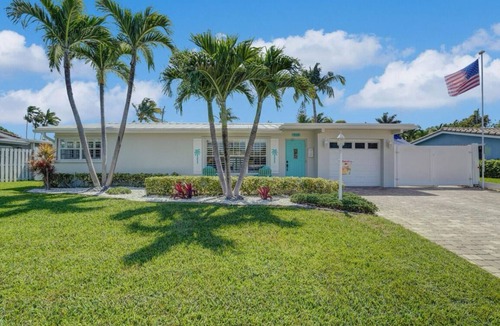Lighthouse Point House | Pet friendly house with a heated pool and hot tub!
