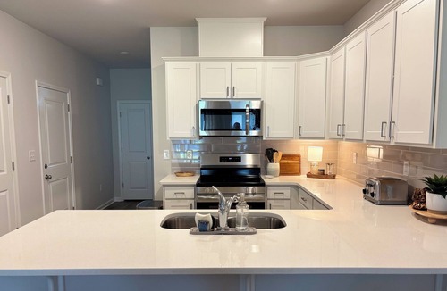 Ocean Isle Beach House | Pet friendly! King bed, smart TVs, mins to beaches from this brand new townhome