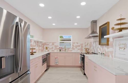 Coral Ridge Villa | Pink Palm Pool Paradise: Perfect Place for Photos