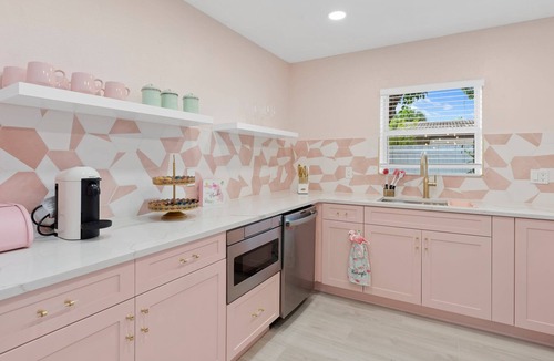 Coral Ridge Villa | Pink Palm Pool Paradise: Perfect Place for Photos