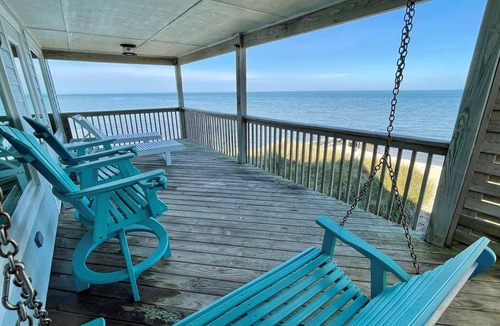 Ocracoke House | Point Of View: Relax on the deck watching passing boats and kayaks.