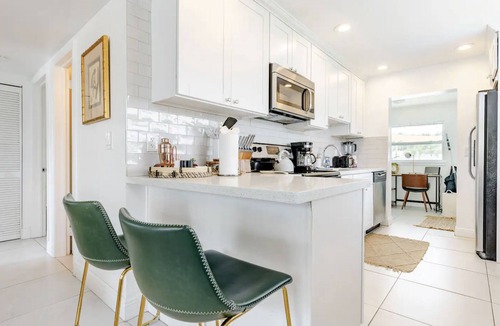 Lake Worth Cottage | Pool, Hot tub, 5 min to beach! The Monkey Cottage!