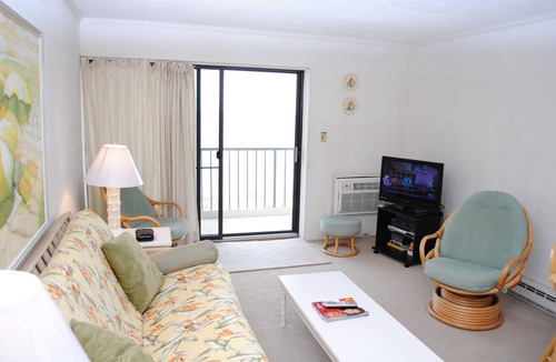 Midtown Ocean City Condo | Pristine, bright 1 bedroom oceanfront condo with free WiFi, coastal decor, and a gorgeous view of the ocean located in quiet midtown and only a few steps from the beach!