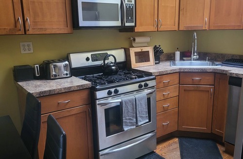 Central Park North Apartment | Private floor with outside balcony in a Harlem Brownstone