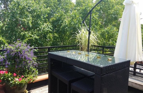 Central Park North Apartment | Private floor with outside balcony in a Harlem Brownstone
