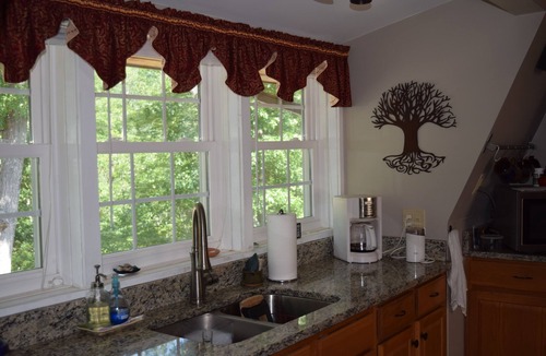Great Cacapon House | Private mountaintop cabin with hot tub, pool table, and breathtaking views
