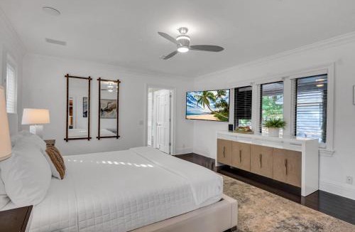 Harbor Beach House | Private neighborhood Heated Pool Walk To Beach Lush Surroundings Harbor Key