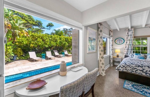 Highland Park Delray Villa | Red Palm Villas: The Saw Palmetto
