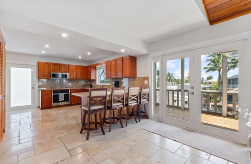 Twin Lakes House | Reel Paradise in Key Largo - 4 bed 3.5 bath, pool, outdoor kitchen, and dock.