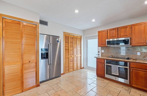 Twin Lakes House | Reel Paradise in Key Largo - 4 bed 3.5 bath, pool, outdoor kitchen, and dock.