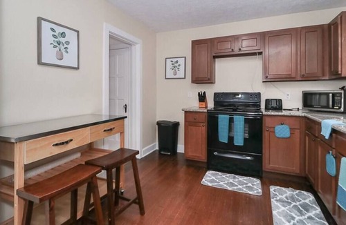 South Euclid House | Relaxing Brick Tudor Home near Oakwood Park