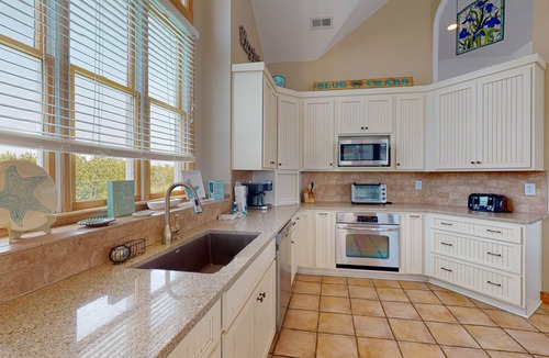 Pine Island House | Relaxing semi-oceanfront Corolla home with private pool & hot tub, rec room