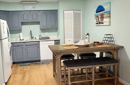 Village Green House | Remodeled Family Home with Cozy Front Porch