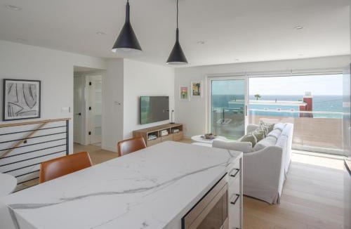 El Porto Apartment | Renovated 2BR Steps from the Pacific with AC Parking