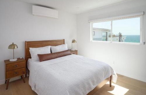 El Porto Apartment | Renovated 2BR Steps from the Pacific with AC Parking