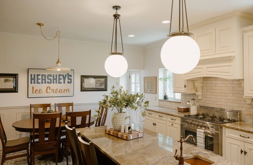 Shelby House | Renovated historic 7BR, 4.5-bath home in Shelby sleeping up to 14 guests. Walk to downtown shops, restaurants, bars, and brewery experiences while enjoying a cozy, spacious stay near Mansfield attractions.
