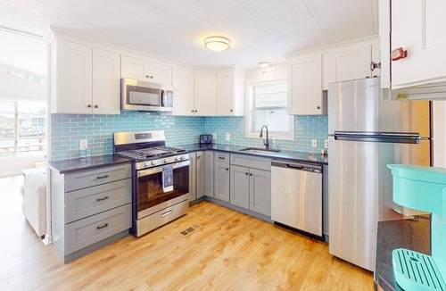 Montego Bay House | Renovated waterfront home with dock, bay access, & shared pool/tennis