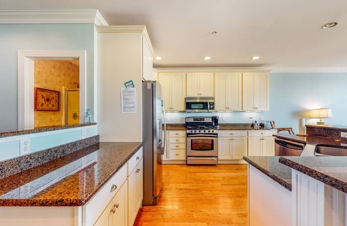 Fenwick Island House | Salt Meadows townhouse w/elevator, gas fireplace & community pool and pier