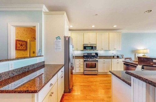 Fenwick Island House | Salt Meadows townhouse w/elevator, gas fireplace & community pool and pier