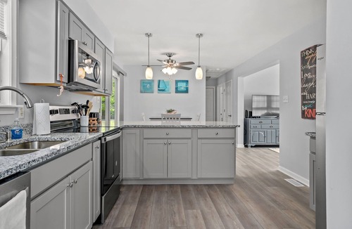 Captain's Cove House | Seahorse Cove | Renovated Coastal Retreat, Screened Porch, Resort Amenities + Pet Friendly