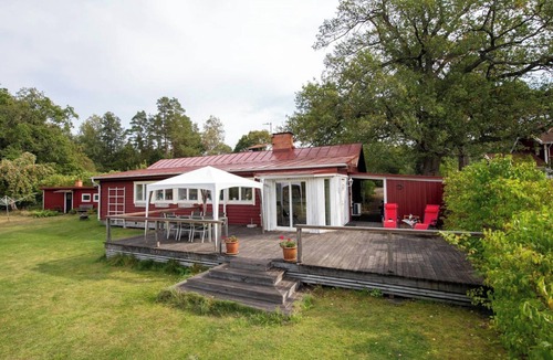 Vasteras Villa | Seaside plot with private jetty, rowing boat & sunset