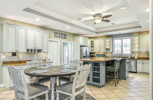 Sunrise Bay House | Secluded lakefront home with elevator, dock, private saltwater pool & hot tub