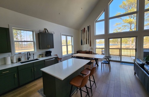 Marion Station House | Secluded waterfront getaway with hot tub,fire pit, and private dock.