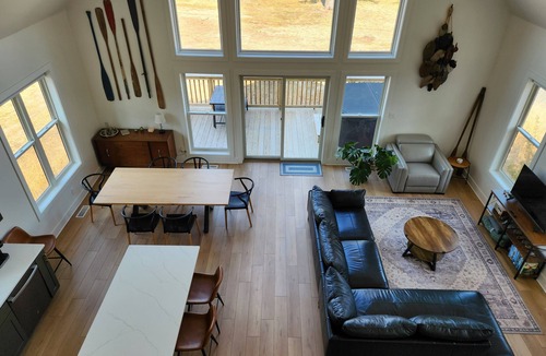 Marion Station House | Secluded waterfront getaway with hot tub,fire pit, and private dock.