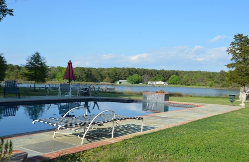 Bozman House | Secluded Waterfront Property on 3 acres with swimming pool and dock.