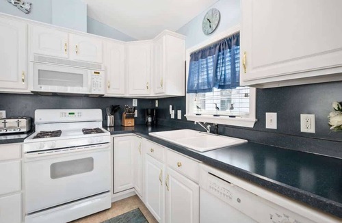 Ocean Pines House | Snowbird Bay Cottage | Playground + Community Pool